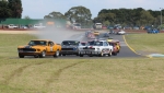 Perry Spiridis, Darrin Davies and Les Walmsley lead the pack into Turn 2