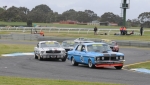 Rod \'Hot Chicken\' Hotchkin leads Darrin Davies\' ex-John Mann Mustang on to the straight