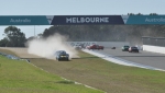 Leo Tobin spins on oil, sandblasting in the gravel trap