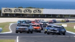 Les Walmsley\'s Charger has the inside line into Turn 4