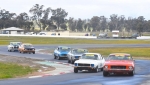 Before the heavens opened. Tessari's Monaro leads the Cup