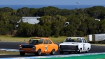 A-different-Ford-vs-Holden-battle-Lachlan-Thomas-Escort-1300-Tas-Shane-Cowham-Holden-HD-Qld