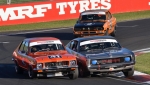 Elliot-Barbour-challenges-Les-Walmsley_s-Charger-with-Jason-Humble_s-Mazda-ready-to-pounce.-Terry-Hines-photo