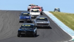 Black-beauty-Champ-in-waiting-Pete-Mueleman_s-Mustang-dives-into-MG-Corner.-Phil-Wisewould-photo