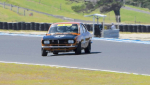 Jason-Humble-gets-the-RX-2-round-his-ear-battling-the-V8s