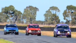 R1-podium-Vic_s-Darren-Hossack-Mazda-Andrew-Williams-Torana-and-Peter-McNiven-Mazda