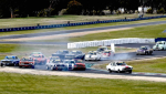 R1-T1-red-flag-after-Graeme-Wakefield_s-blue-Mustang-spins-into-Bill-Trengrove_s-red-one